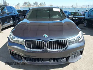 2019 BMW 7 Series 740i with VIN WBA7E2C53KB218375, listed as a IAAI auction lot 42008827 with 61,337 mi miles and . Bid and sale history available at DreamBid. Image 12.
