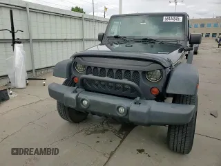 2013 Jeep Wrangler Unlimited Sport with VIN 1C4BJWDG0DL560265, listed as a Copart auction lot 58444045 with 111,354 mi miles and Salvage title. Bid and sale history available at DreamBid. Image 14.