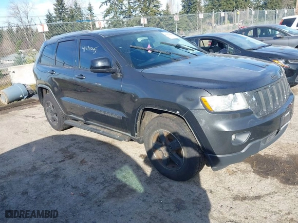 2011 Jeep Grand Cherokee Laredo with VIN 1J4RR4GG2BC670264, listed as a IAAI auction lot 41670045 with 252,044 mi miles. Bid and sale history available at carsss.com. Image 1.
