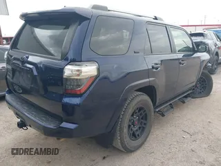2023 Toyota 4Runner SR5 with VIN JTEEU5JR2P5297771, listed as a IAAI auction lot 42640698 with 49,151 mi miles and . Bid and sale history available at DreamBid. Image 4.