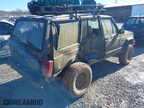 1996 Jeep Cherokee Country with VIN 1J4FJ78S8TL194375, listed as a IAAI auction lot 41286995 with 147,792 mi miles. Bid and sale history available at carsss.com. Image 4.