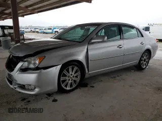 2010 Toyota Avalon XL with VIN 4T1BK3DBXAU370684, listed as a Copart auction lot 54185975 with 163,607 mi miles and Salvage Title. Bid and sale history available at DreamBid. Image 1.