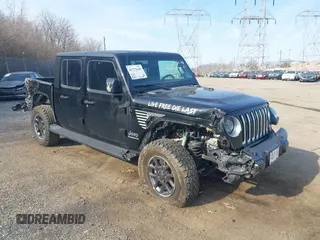 2021 Jeep Gladiator Overland z VIN 1C6HJTFG1ML606215, wystawiony jako IAAI lot #41771646 z przebiegiem 77 411 mil mil oraz . Historia ofert i sprzedaży dostępna na DreamBid. Obrazek 17.