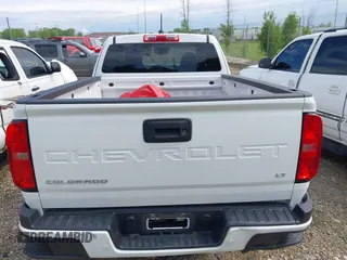 2021 Chevrolet Colorado 2WD LT with VIN 1GCHSCEA8M1205131, listed as a IAAI auction lot 42273672 with 84,711 mi miles and . Bid and sale history available at DreamBid. Image 17.