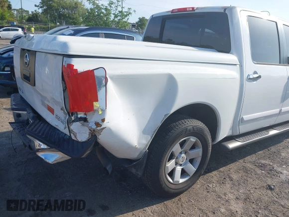 2006 Nissan Titan LE with VIN 1N6BA07A56N525360, listed as a IAAI auction lot 41934477 with 195,851 mi miles and . Bid and sale history available at DreamBid. Image 6.