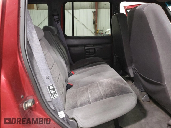 1999 Ford Explorer XL z VIN 1FMZU34X3XUB61123, wystawiony jako Copart lot #42259585 z przebiegiem 148 382 mil mil oraz Szkoda całkowita • Salvage title. Historia ofert i sprzedaży dostępna na DreamBid. Obrazek 11.