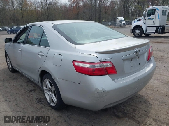 2007 Toyota Camry CE with VIN 4T1BE46K47U528827, listed as a IAAI auction lot 42123907 with 257,248 mi miles. Bid and sale history available at carsss.com. Image 3.