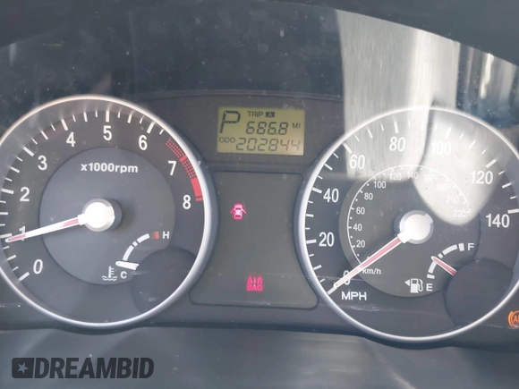 2007 Hyundai Accent SE with VIN KMHCN36C47U009459, listed as a IAAI auction lot 41979395 with 202,844 mi miles. Bid and sale history available at carsss.com. Image 7.