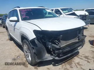 2021 Volkswagen Atlas SE z VIN 1V2JR2CA2MC568540, wystawiony jako IAAI lot #41977289 z przebiegiem 70 493 mil mil oraz . Historia ofert i sprzedaży dostępna na DreamBid. Obrazek 1.