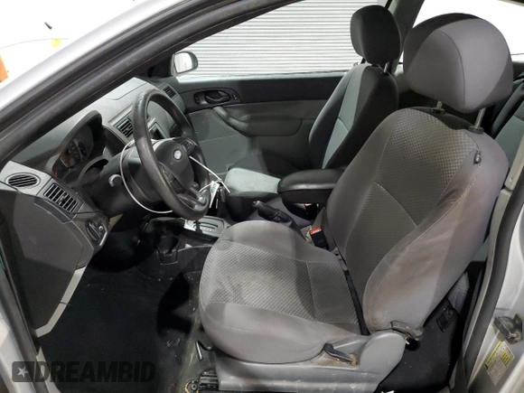 2007 Ford Focus S with VIN 1FAHP31N57W113952, listed as a Copart auction lot 51070245 with 149,809 mi miles and Salvage Title. Bid and sale history available at DreamBid. Image 7.