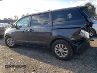 2019 Kia Sedona EX with VIN KNDMB5C13K6535725, listed as a Copart auction lot 82519594 with 57,129 mi miles and Salvage Title. Bid and sale history available at DreamBid. Image 2.