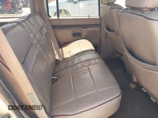 1994 Ford Explorer Eddie Bauer z VIN 1FMDU34X4RUB96329, wystawiony jako IAAI lot #42105903 z przebiegiem 52 719 mil mil oraz . Historia ofert i sprzedaży dostępna na DreamBid. Obrazek 8.