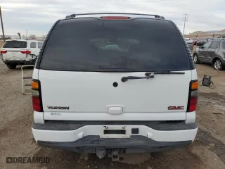 2004 GMC Yukon Denali with VIN 1GKEK63U84J270731, listed as a Copart auction lot 49094635 with 184,529 mi miles and Salvage Title. Bid and sale history available at carsss.com. Image 6.