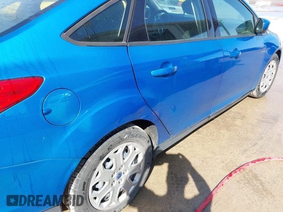 2012 Ford Focus SE with VIN 1FAHP3F24CL415176, listed as a IAAI auction lot 41993864 with 103,805 mi miles. Bid and sale history available at carsss.com. Image 6.