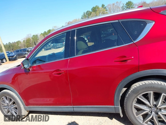 2018 Mazda CX-5 Grand Touring with VIN JM3KFADM3J0380826, listed as a IAAI auction lot 41888097 with 70,529 mi miles. Bid and sale history available at carsss.com. Image 15.