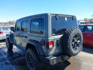 2022 Jeep Wrangler Unlimited Sport S with VIN 1C4HJXDG1NW200793, listed as a IAAI auction lot 41810817 with 35,212 mi miles. Bid and sale history available at carsss.com. Image 14.