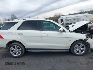 2012 Mercedes-Benz M ML 350 with VIN 4JGDA5HB5CA077443, listed as a IAAI auction lot 42093345 with 122,147 mi miles. Bid and sale history available at carsss.com. Image 13.