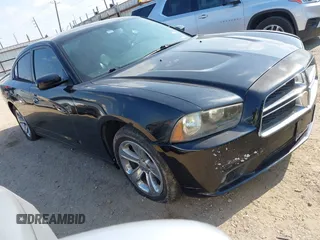 2013 Dodge Charger SXT z VIN 2C3CDXHG6DH552605, wystawiony jako IAAI lot #42414305 z przebiegiem Nie podano mil oraz . Historia ofert i sprzedaży dostępna na DreamBid. Obrazek 1.