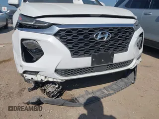2019 Hyundai Santa Fe SE with VIN 5NMS23AD8KH051223, listed as a IAAI auction lot 42017754 with 146,704 mi miles and . Bid and sale history available at DreamBid. Image 6.