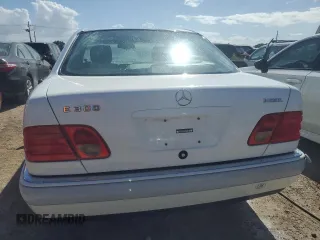 1996 Mercedes-Benz E Class with VIN WDBJF20F1TJ019480, listed as a Copart auction lot 76764114 with 0 mi miles and Salvage Title. Bid and sale history available at carsss.com. Image 6.