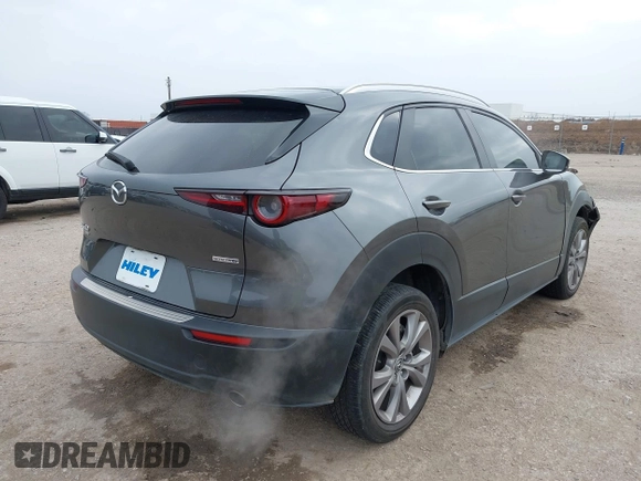 2022 Mazda CX-30 2.5 S Carbon Edition with VIN 3MVDMBCL4NM451121, listed as a IAAI auction lot 41506613 with 24,742 mi miles. Bid and sale history available at carsss.com. Image 4.