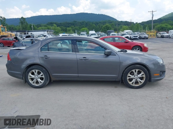 2012 Ford Fusion SE with VIN 3FAHP0HA8CR155501, listed as a IAAI auction lot 42593452 with 145,269 mi miles and . Bid and sale history available at DreamBid. Image 13.