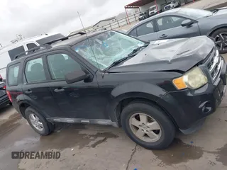 2011 Ford Escape XLS z VIN 1FMCU0C73BKB97601, wystawiony jako IAAI lot #42498599 z przebiegiem 243 282 mil mil oraz . Historia ofert i sprzedaży dostępna na DreamBid. Obrazek 13.