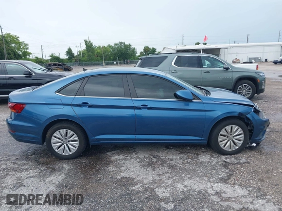 2019 Volkswagen Jetta S z VIN 3VWC57BU4KM005853, wystawiony jako IAAI lot #42183004 z przebiegiem 104 691 mil mil oraz . Historia ofert i sprzedaży dostępna na DreamBid. Obrazek 13.