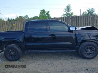 2016 Toyota Tacoma SR5 with VIN 5TFAX5GN4GX060296, listed as a IAAI auction lot 42158554 with 219,859 mi miles and . Bid and sale history available at DreamBid. Image 13.
