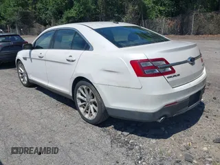 2013 Ford Taurus Limited with VIN 1FAHP2J84DG187311, listed as a IAAI auction lot 42631258 with 112,805 mi miles and . Bid and sale history available at DreamBid. Image 3.