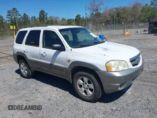 2003 Mazda Tribute LX with VIN 4F2YZ04133KM33963, listed as a IAAI auction lot 41854643 with 129,451 mi miles and . Bid and sale history available at carsss.com. Image 1.
