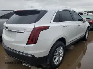 2022 Cadillac XT5 FWD Luxury z VIN 1GYKNAR48NZ163921, wystawiony jako Copart lot #74507874 z przebiegiem 5 723 mil mil oraz Nie do naprawy • Non repairable. Historia ofert i sprzedaży dostępna na DreamBid. Obrazek 3.