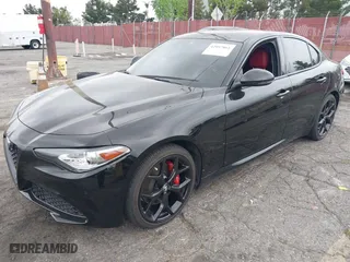 2021 Alfa Romeo Giulia Ti Sport with VIN ZARFAMBN5M7645723, listed as a IAAI auction lot 42057861 with 63,594 mi miles. Bid and sale history available at carsss.com. Image 2.