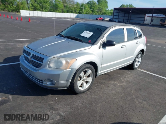 2011 Dodge Caliber Mainstreet with VIN 1B3CB3HA2BD117839, listed as a IAAI auction lot 42101103 with 142,099 mi miles. Bid and sale history available at carsss.com. Image 2.
