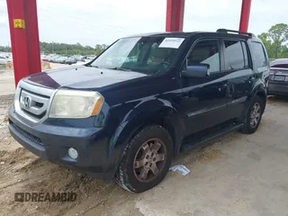 2011 Honda Pilot Touring z VIN 5FNYF3H94BB032105, wystawiony jako IAAI lot #42435522 z przebiegiem 247 899 mil mil oraz . Historia ofert i sprzedaży dostępna na DreamBid. Obrazek 2.