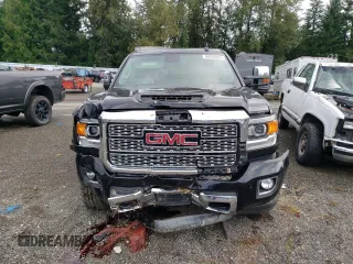 2018 GMC Sierra 3500HD Denali z VIN 1GT42YEY6JF290445, wystawiony jako Copart lot #69260864 z przebiegiem 46 963 mil mil oraz Szkody całkowita. Historia ofert i sprzedaży dostępna na DreamBid. Obrazek 5.