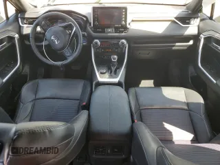 2021 Toyota RAV4 Hybrid XSE with VIN 2T3E6RFVXMW025145, listed as a Copart auction lot 51865655 with 201,591 mi miles and Salvage Title. Bid and sale history available at carsss.com. Image 8.