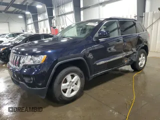 2011 Jeep Grand Cherokee Laredo with VIN 1J4RR4GG9BC555662, listed as a Copart auction lot 52447235 with 151,695 mi miles and Salvage Title. Bid and sale history available at carsss.com. Image 1.
