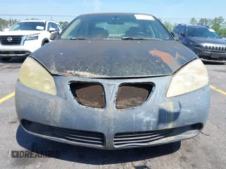 2006 Pontiac G6 z VIN 1G2ZF55B464255298, wystawiony jako IAAI lot #42049077 z przebiegiem 149 863 mil mil oraz . Historia ofert i sprzedaży dostępna na DreamBid. Obrazek 6.