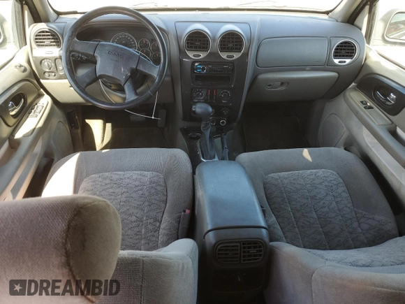 2004 GMC Envoy SLT с VIN 1GKDS13S542129977, выставлен на аукционе Copart как лот 61170465 с пробегом 129 897 миль миль и Списание • Salvage title. История ставок и продаж доступна на DreamBid. Изображение 8.