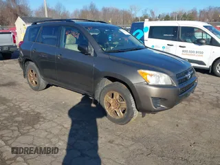 2010 Toyota RAV4 with VIN JTMBF4DV0A5031581, listed as a IAAI auction lot 41714611 with 186,814 mi miles. Bid and sale history available at carsss.com. Image 1.