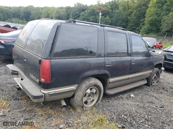 1999 Chevrolet Tahoe Z71 with VIN 1GNEK13R3XJ458174, listed as a Copart auction lot 70461674 with 181,622 mi miles and Salvage Title. Bid and sale history available at carsss.com. Image 3.
