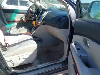 2007 Lexus RX 400h z VIN JTJGW31U372003129, wystawiony jako IAAI lot #41769911 z przebiegiem 231 097 mil mil oraz . Historia ofert i sprzedaży dostępna na DreamBid. Obrazek 5.