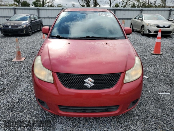 2012 Suzuki SX4 LE with VIN JS2YC5A39C6300577, listed as a Copart auction lot 86998944 with 103,354 mi miles and Non Repairable. Bid and sale history available at carsss.com. Image 5.