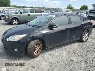 2015 Ford Focus SE with VIN 1FADP3F24FL332799, listed as a Copart auction lot 63376565 with 63,982 mi miles and Clean title. Bid and sale history available at DreamBid. Image 1.