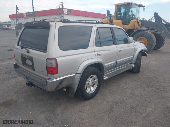 1997 Toyota 4Runner Limited with VIN JT3GN87R2V0024833, listed as a IAAI auction lot 41881359 with 179,115 mi miles. Bid and sale history available at carsss.com. Image 4.
