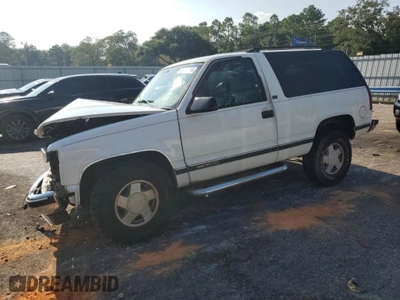 1995 GMC Yukon with VIN 1GKEK18K2SJ700616, listed as a Copart auction lot 68582034 with 205,980 mi miles and Salvage Title. Bid and sale history available at carsss.com. Image 1.