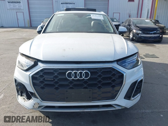 2022 Audi Q5 S line Premium z VIN WA1GAAFY3N2101201, wystawiony jako IAAI lot #41263245 z przebiegiem 28 361 mil mil oraz . Historia ofert i sprzedaży dostępna na DreamBid. Obrazek 11.