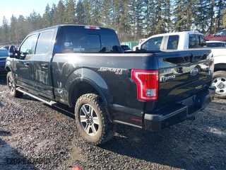 2015 Ford F-150 XLT w/HD Payload Pkg with VIN 1FTFW1EG5FFC13942, listed as a IAAI auction lot 41392709 with 196,416 mi miles. Bid and sale history available at carsss.com. Image 3.