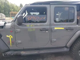 2021 Jeep Wrangler Unlimited Rubicon with VIN 1C4HJXFN3MW816375, listed as a IAAI auction lot 42480514 with 62,324 mi miles and . Bid and sale history available at DreamBid. Image 14.
